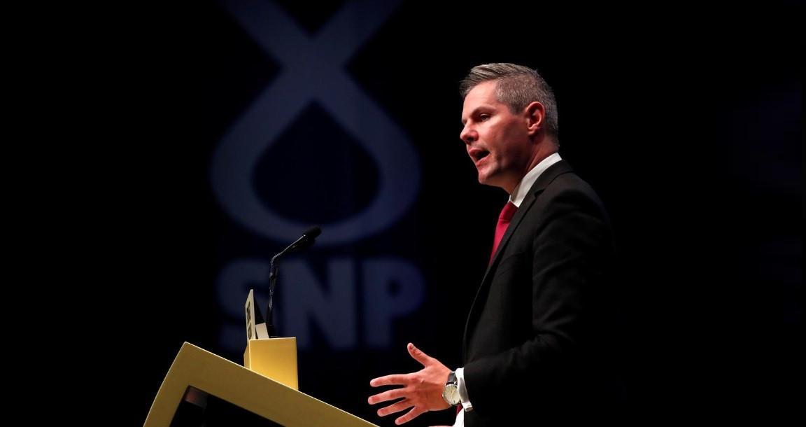 Scottish finance chief quits after report he messaged 16-year-old boy