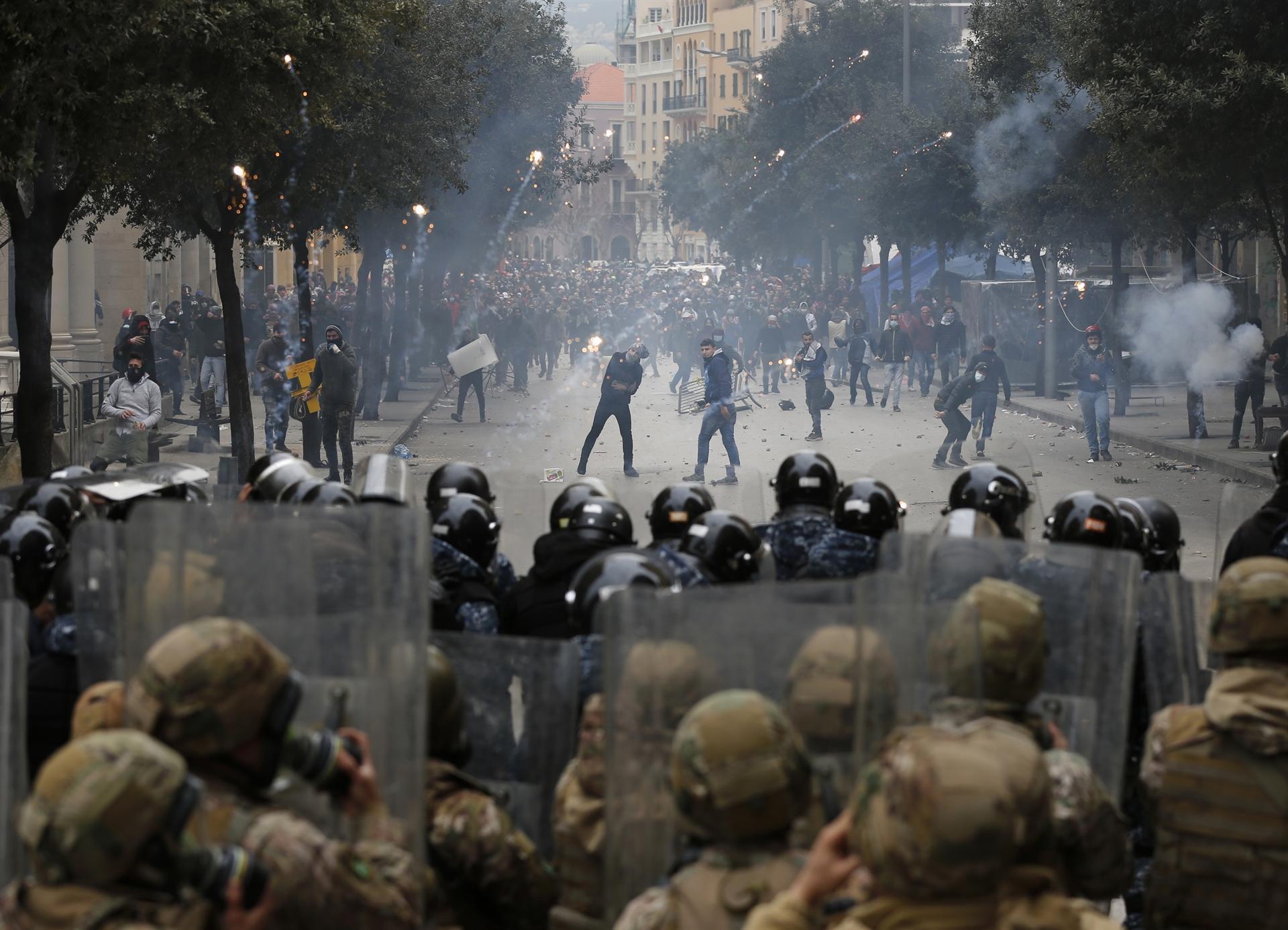 Lebanon government wins confidence vote as protests rock Beirut