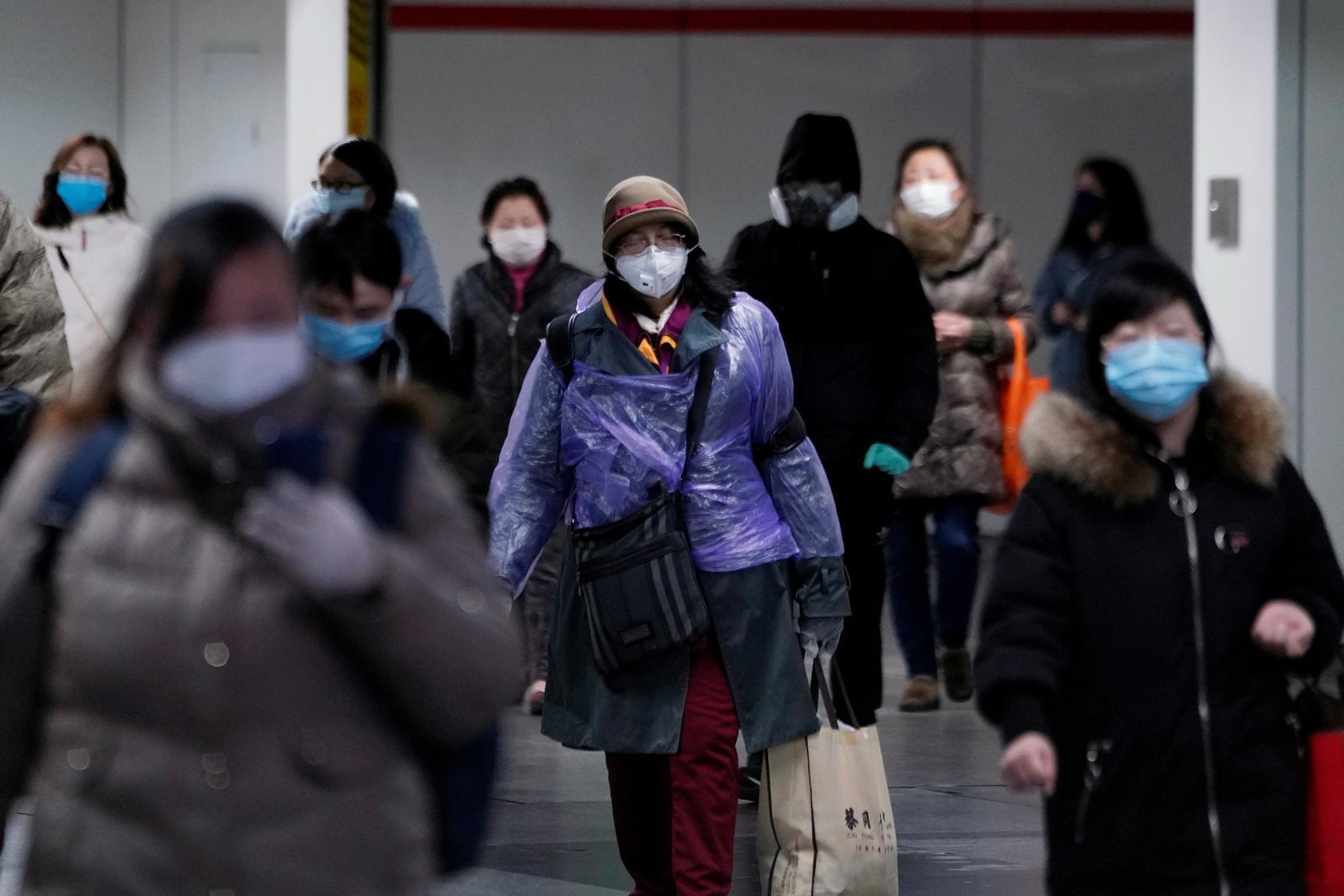 Hundreds of Americans flown home from cruise ship, 14 with coronavirus