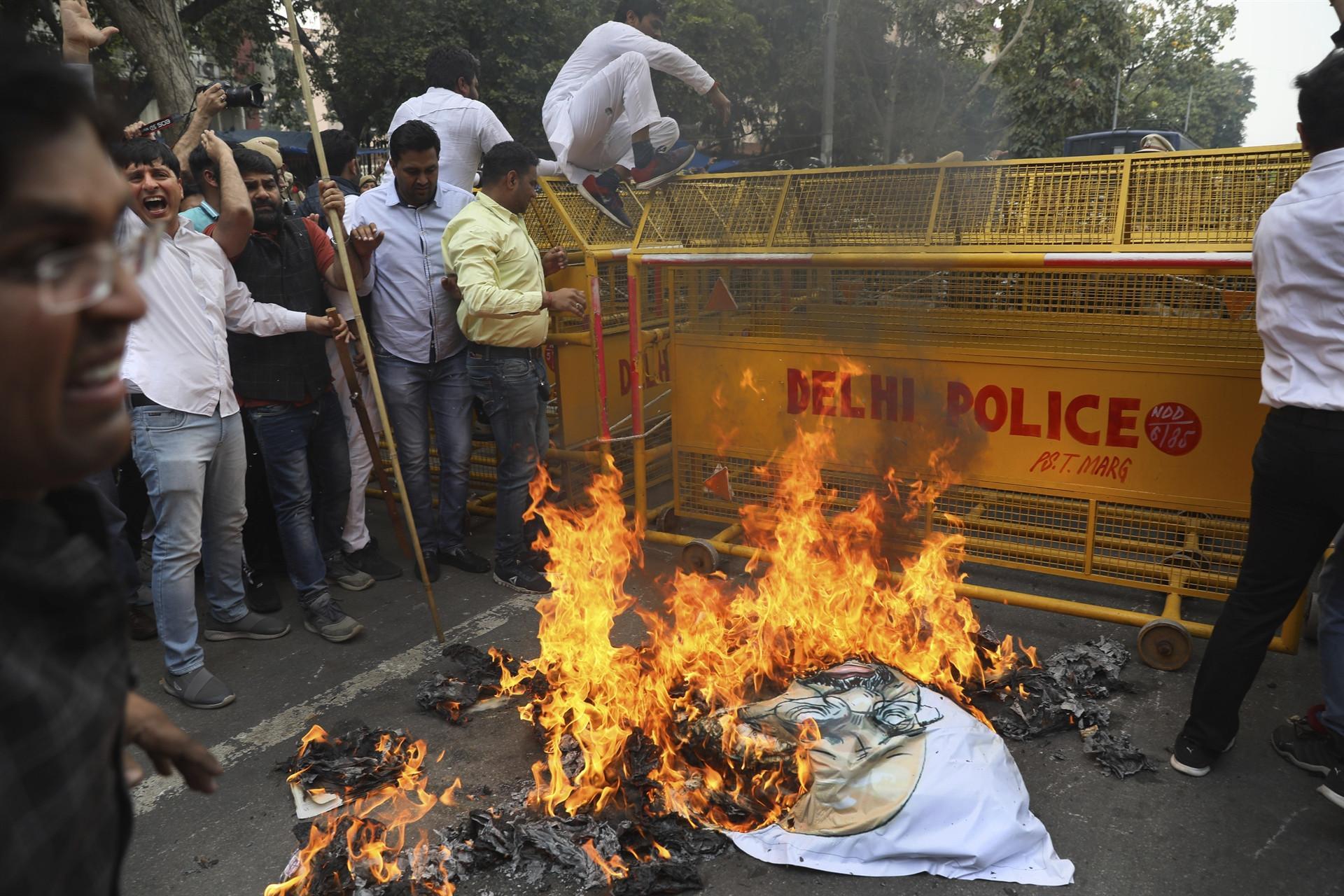 Indian lawmakers scuffle over citizenship riots where 41 died