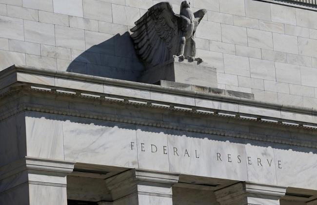 Fed takes emergency steps to slash rates and ease bank rules