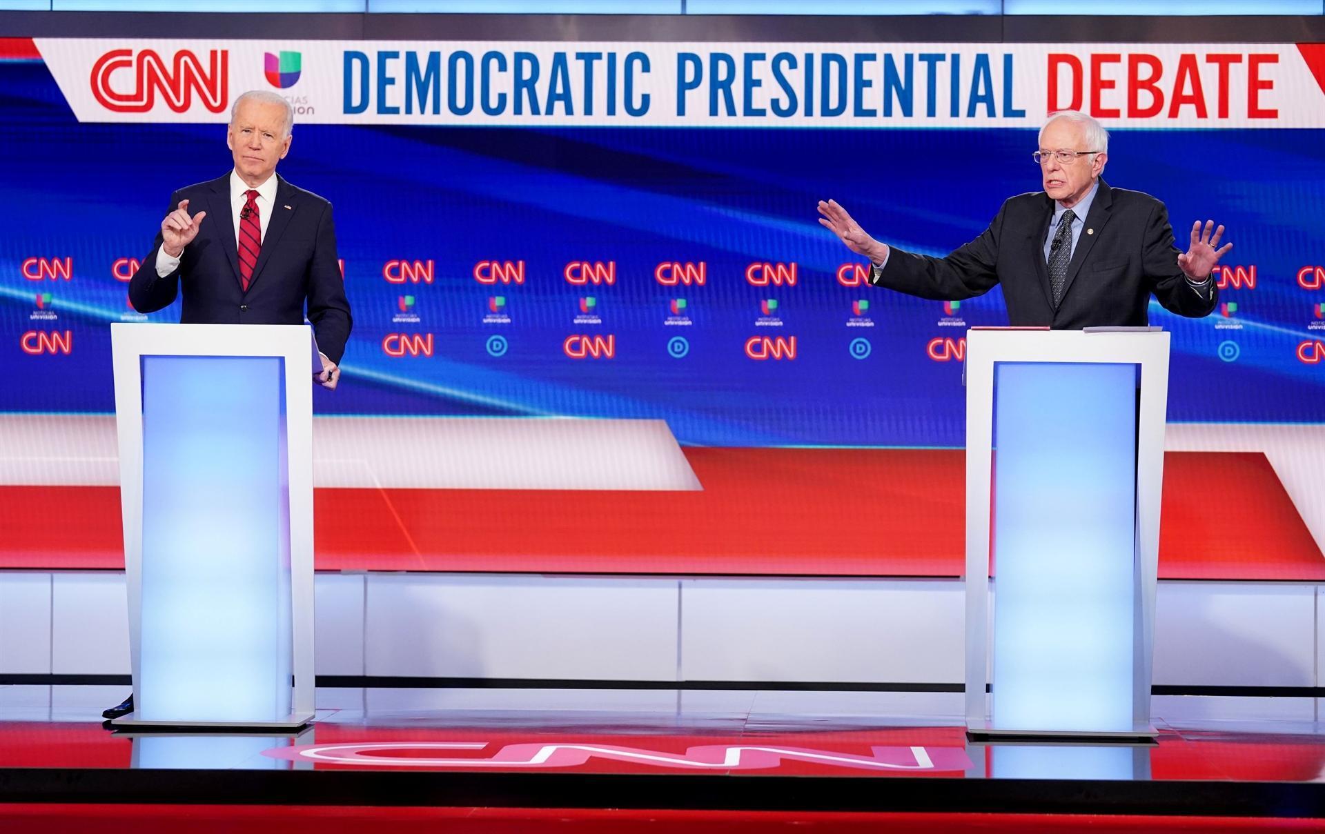Biden and Sanders criticize Trump on coronavirus, tout their own crisis leadership