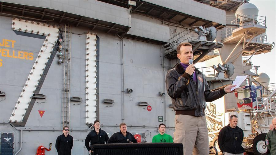 Fired US Navy captain leaves his ship to sailors applause