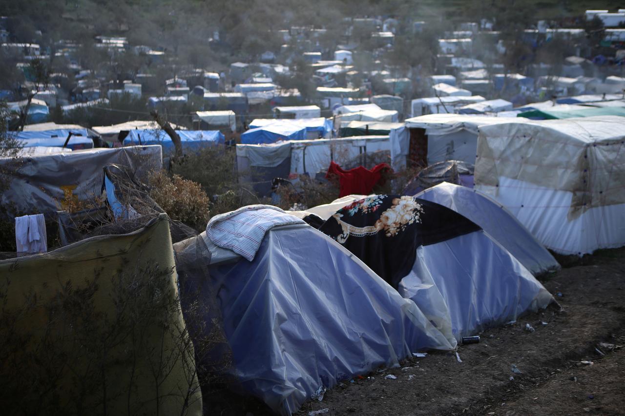 Extensive damage at Greek migrant camp after fire, protests