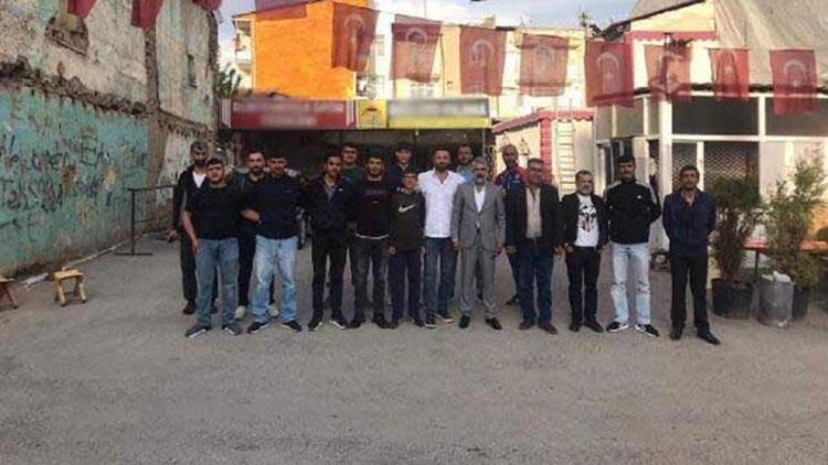 People fined for violating virus rules in group photo