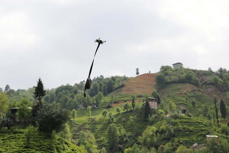 Village head uses drone to distribute face masks to residents