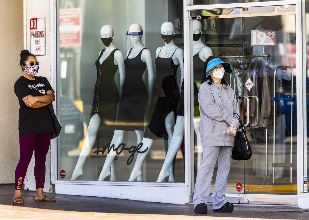 Virus hot spots flare, hospitals tested as economies reopen