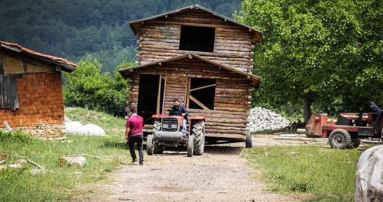 House moved by truck to keep deceased owner’s memory alive