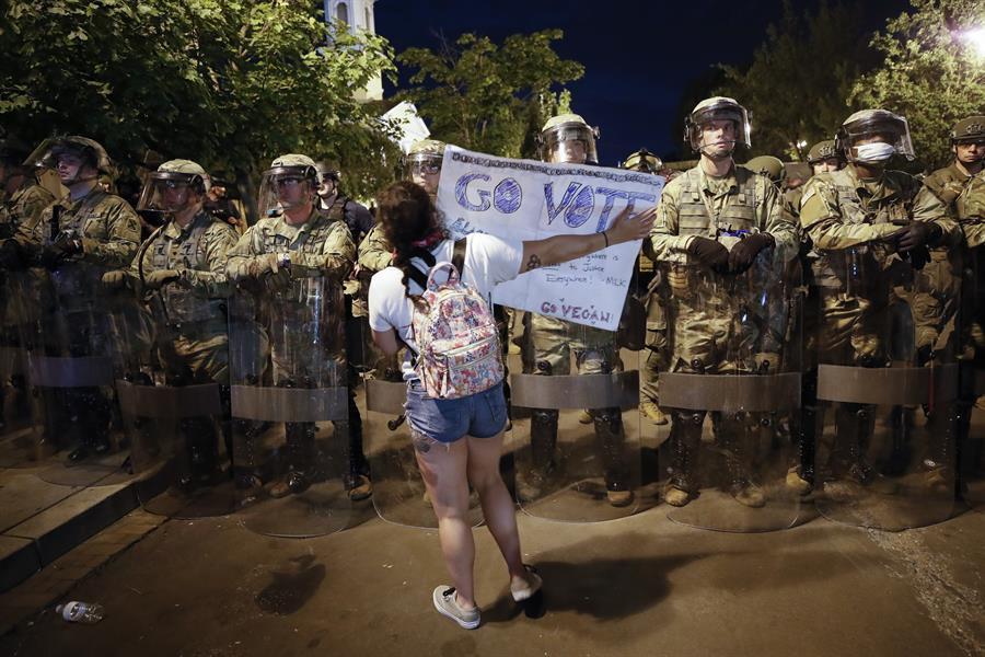 New charges against Minneapolis policemen as protests continue