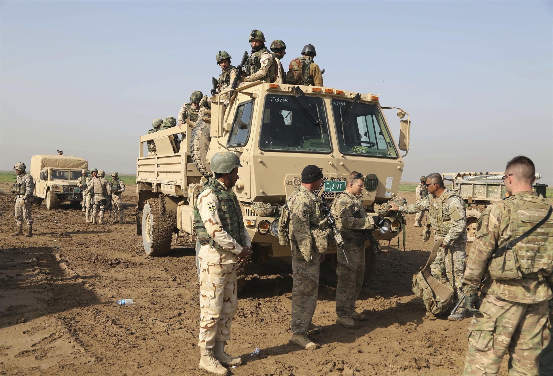 US pledges to reduce Iraq troops as tensions ease