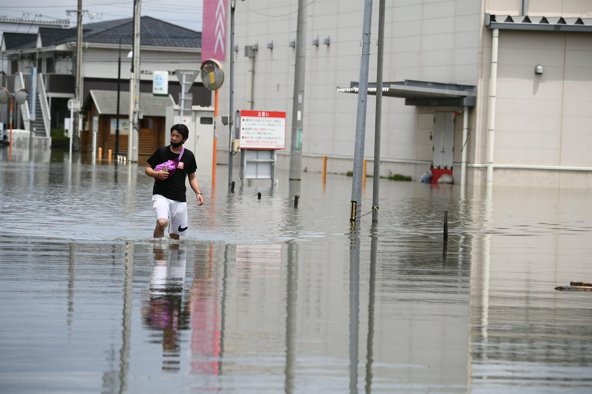 Japan battered by more heavy rain, floods, nearly 60 dead