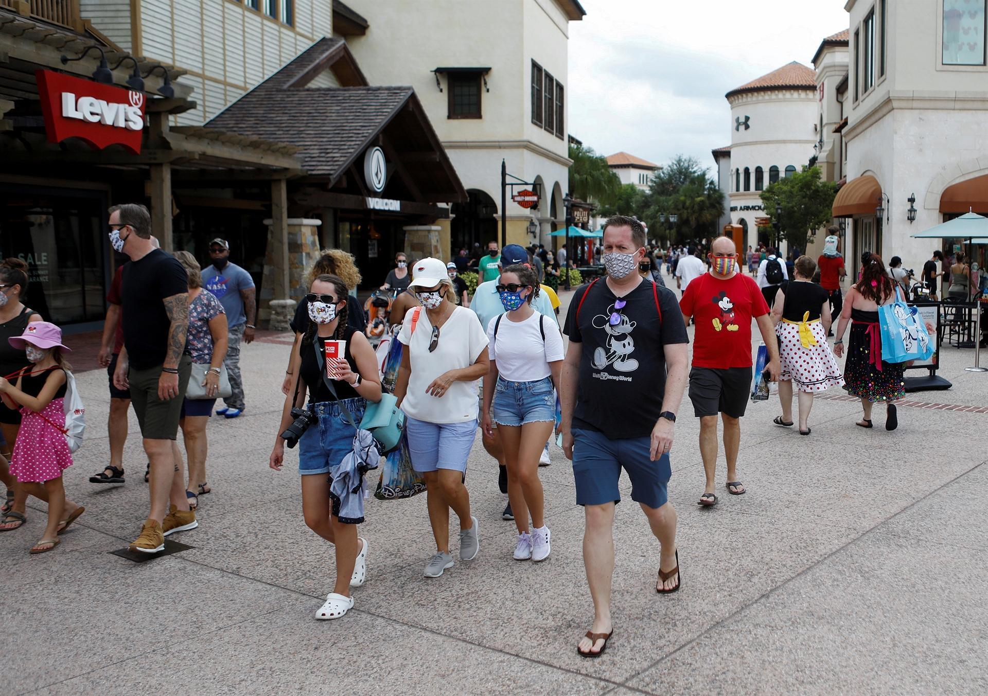 Mickey at a distance as Walt Disney World reopens