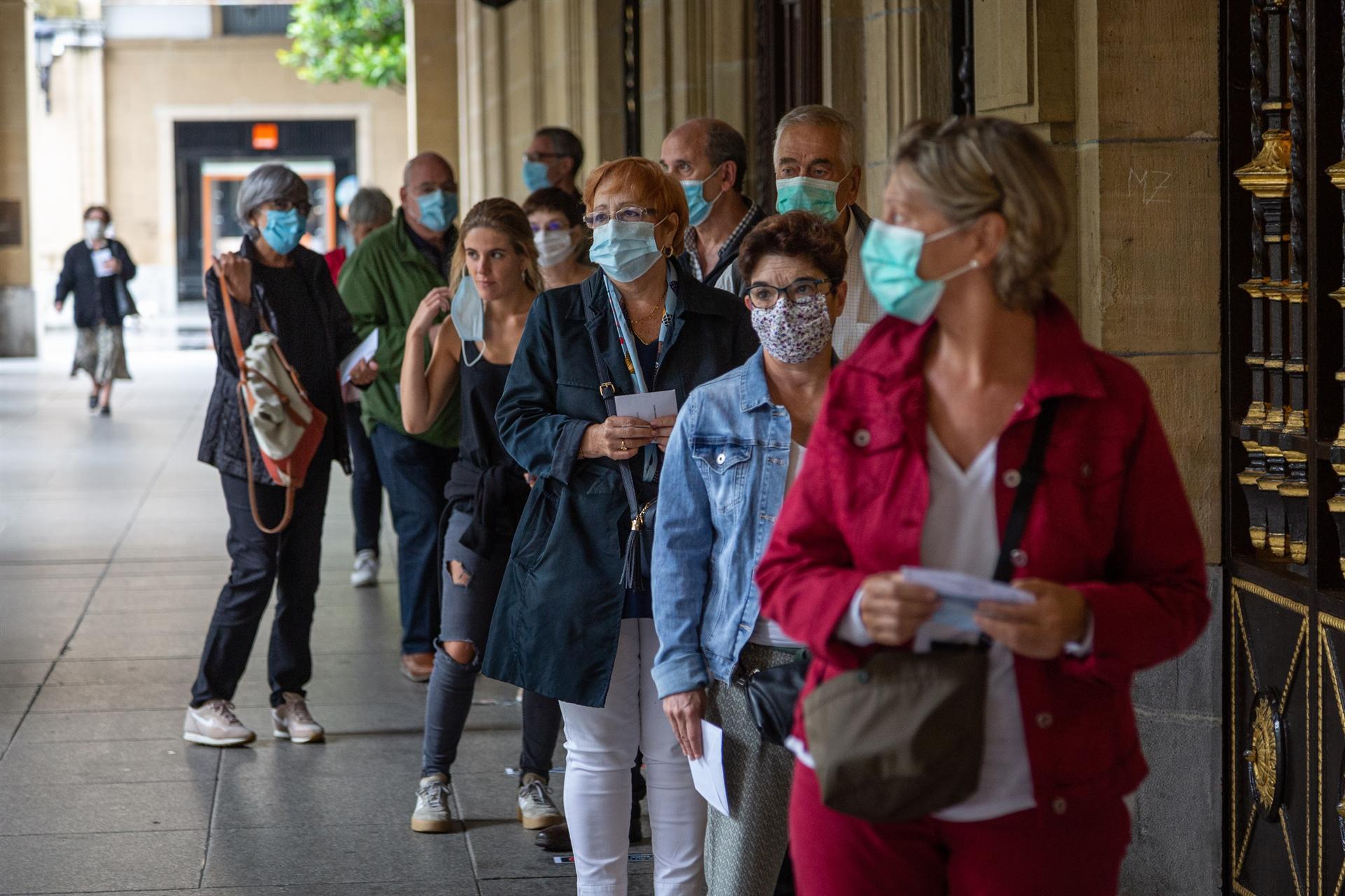 Virus surge sparks S Africa curfew and Spain local lockdown