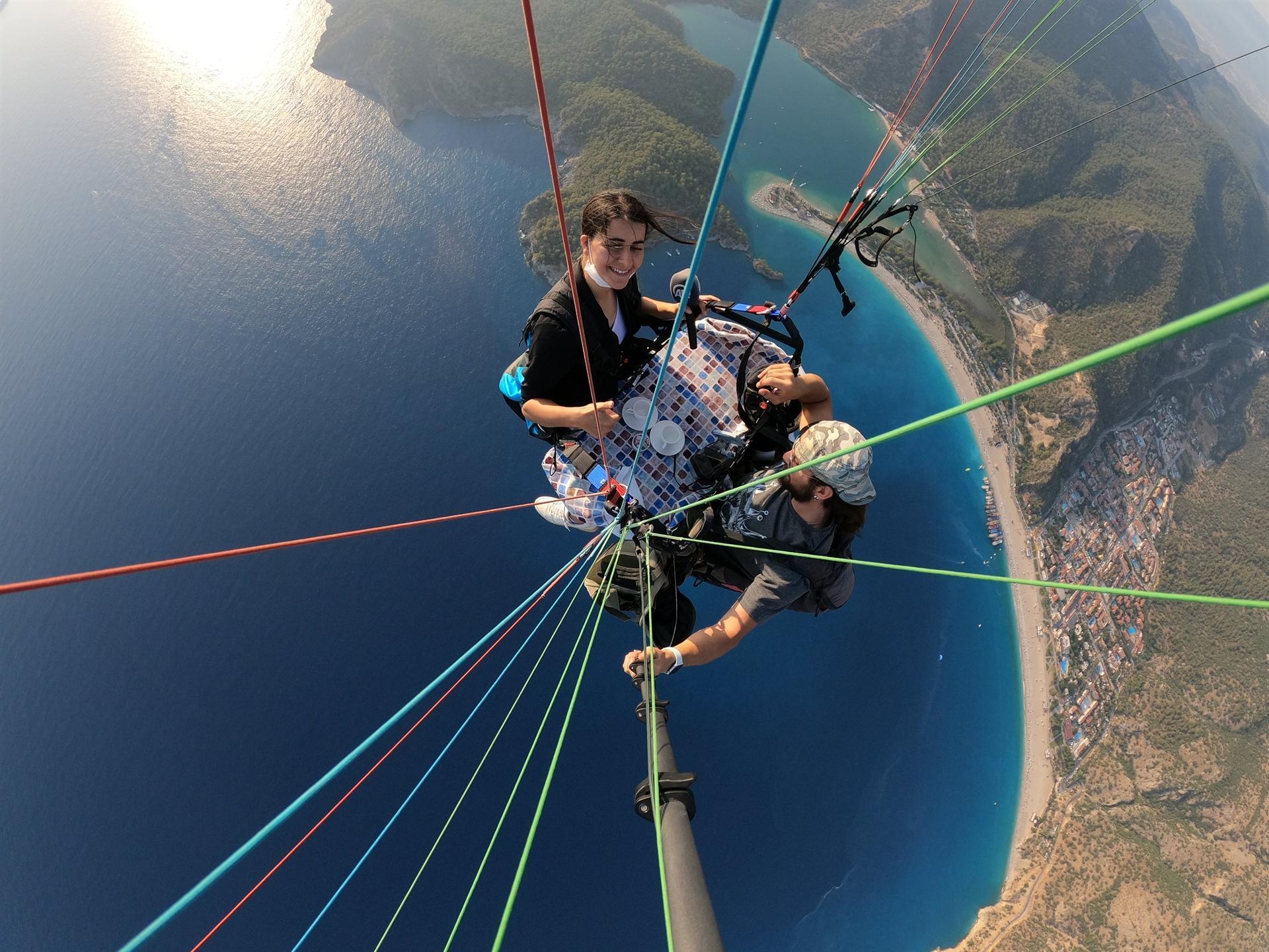 Turkish man paraglides while sipping on coffee