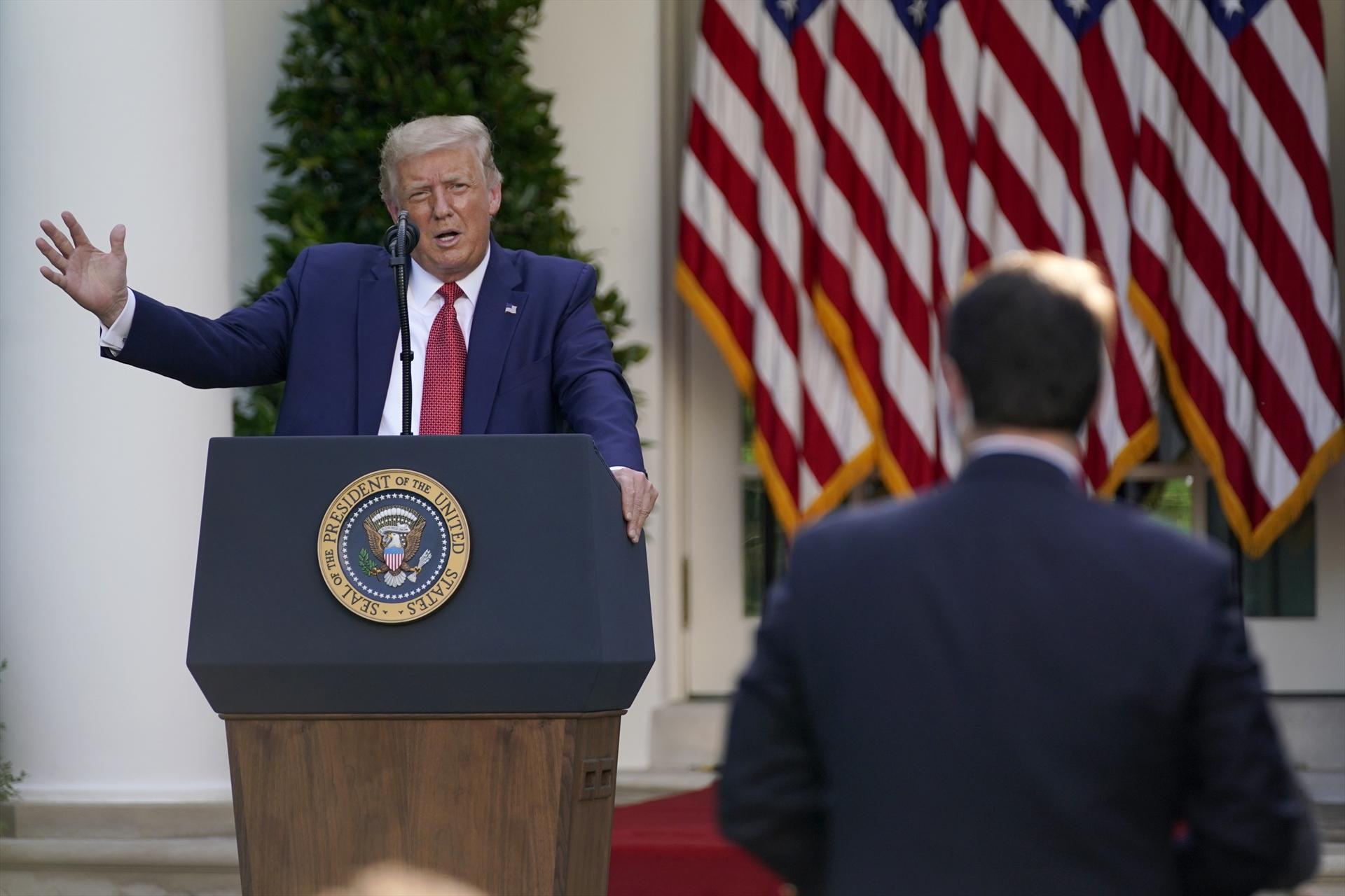 Trump signs bill, order rebuking China, and slams Biden