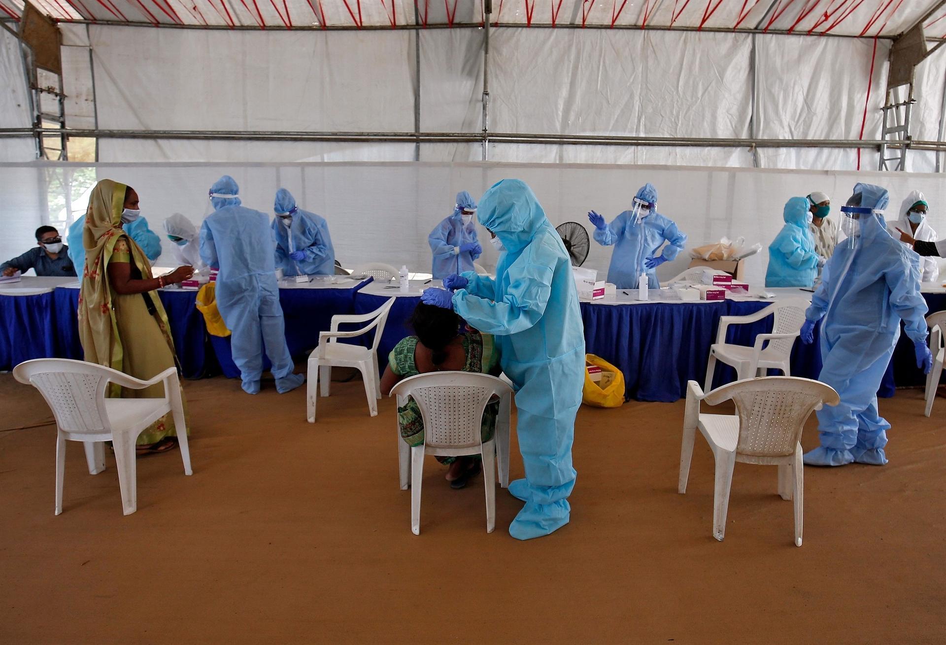 Russia accused of vaccine hacking as Brazil crosses 2 million cases
