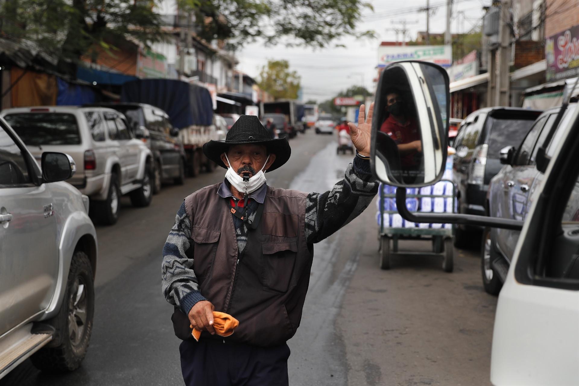 Global virus deaths pass 650,000 as new surges prompt fresh curbs