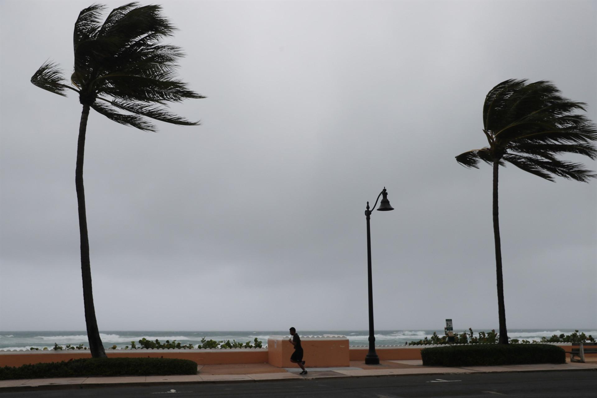 A weakened Tropical Storm Isaias lashes virus-hit Florida