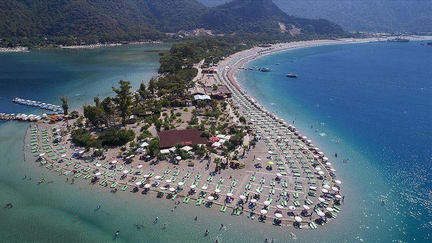 Ölüdeniz beaches dazzle with nature, gliding