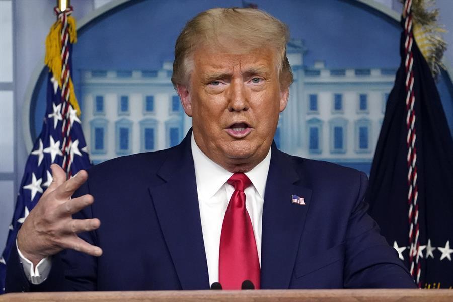 Trump expects enough Covid-19 vaccines for every American by April
