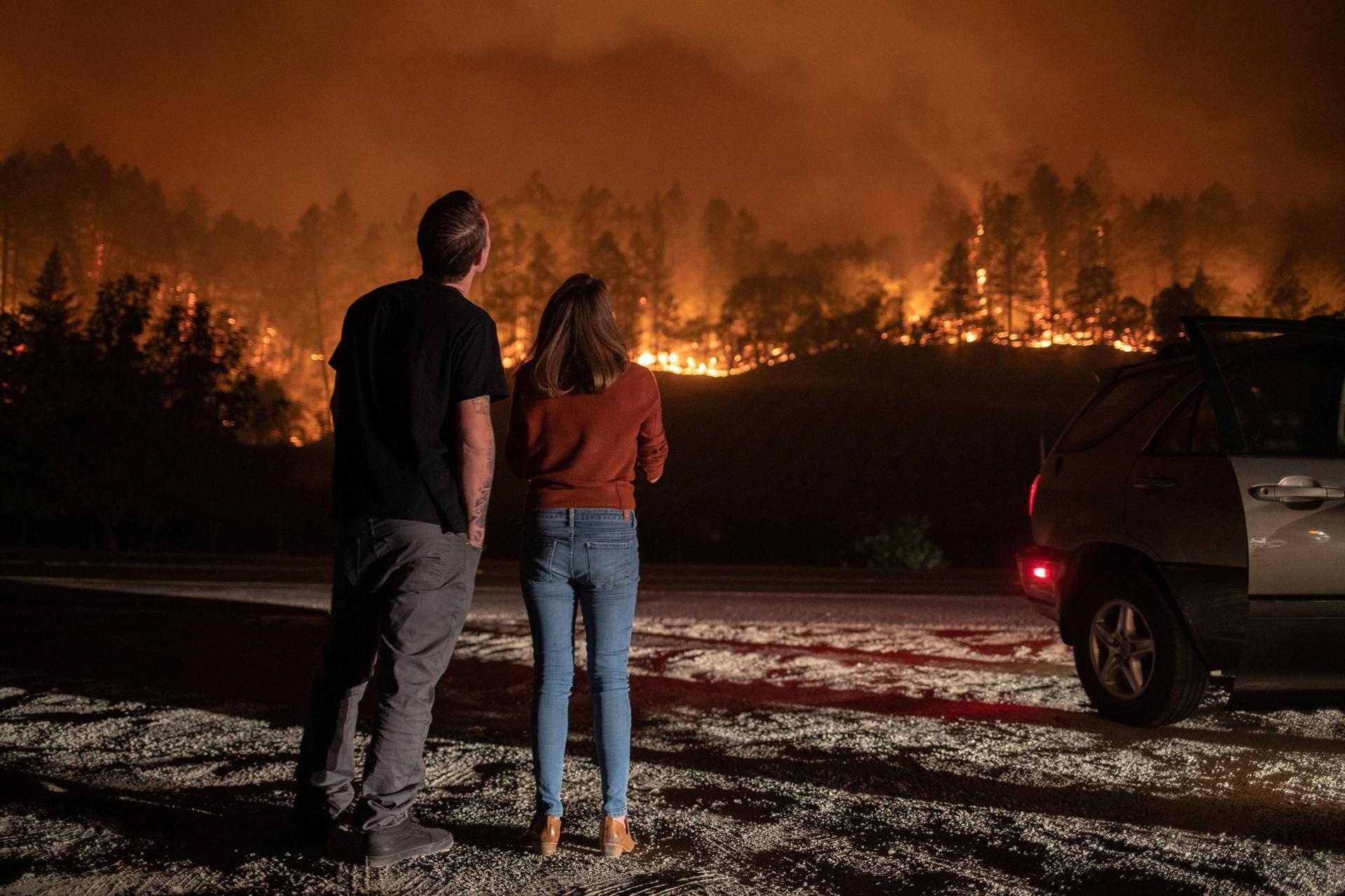 Wildfires rip through California wine country, tens of thousands flee