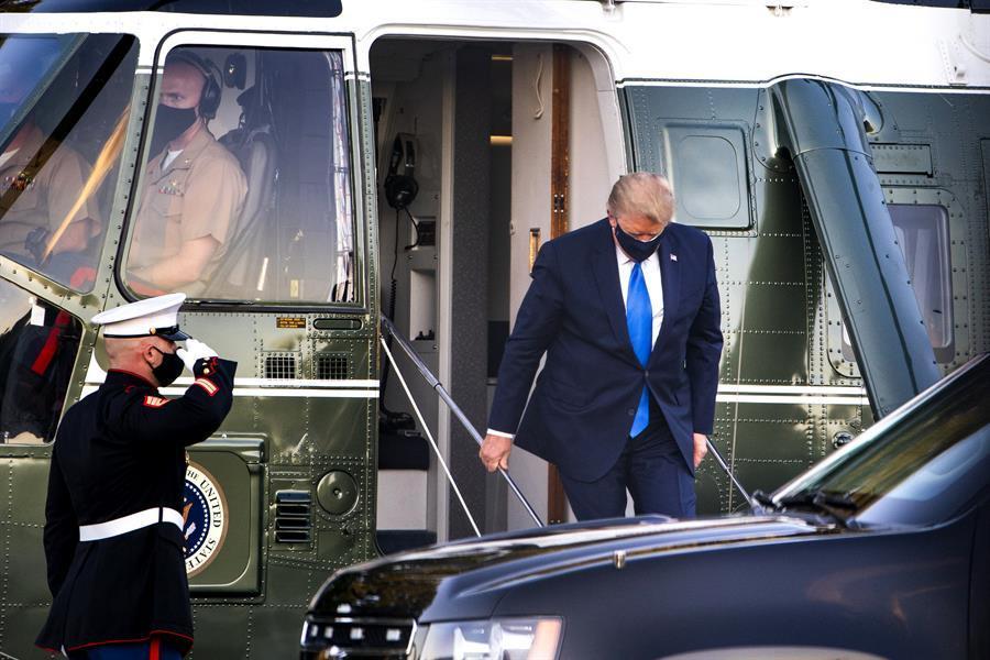 Trump, stricken by COVID-19, flown to military hospital