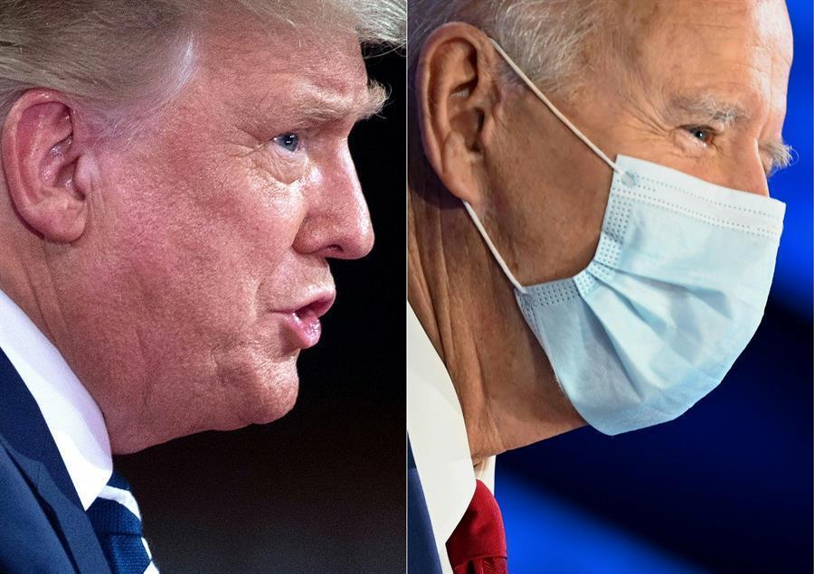 Trump, Biden go at it - from a distance - in town halls
