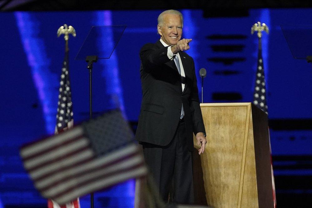 Biden promotes unity, turns to business of transition
