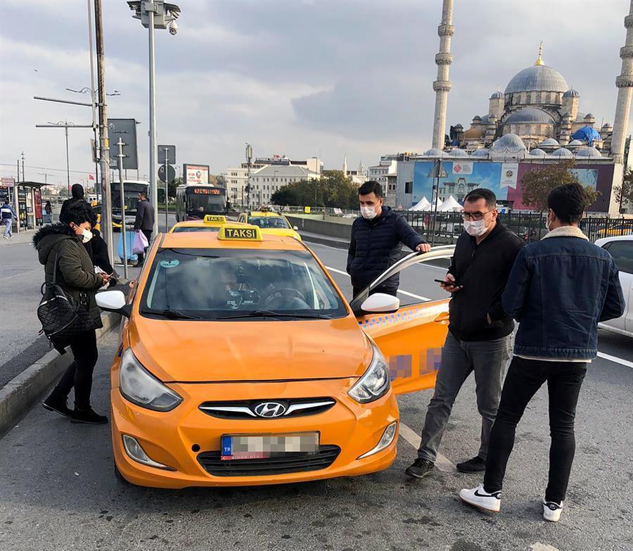 Police teams inspect taxi drivers in Istanbul