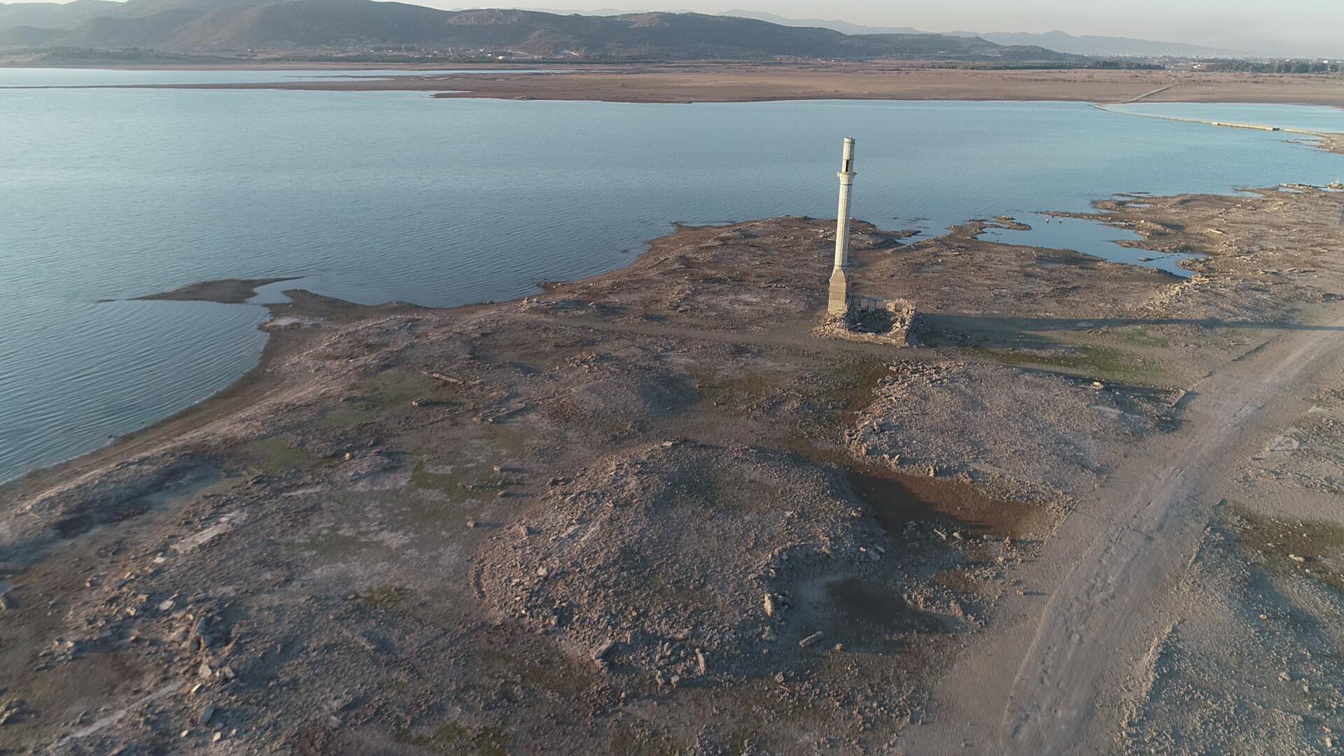 Submerged village revealed after drop in rainfall