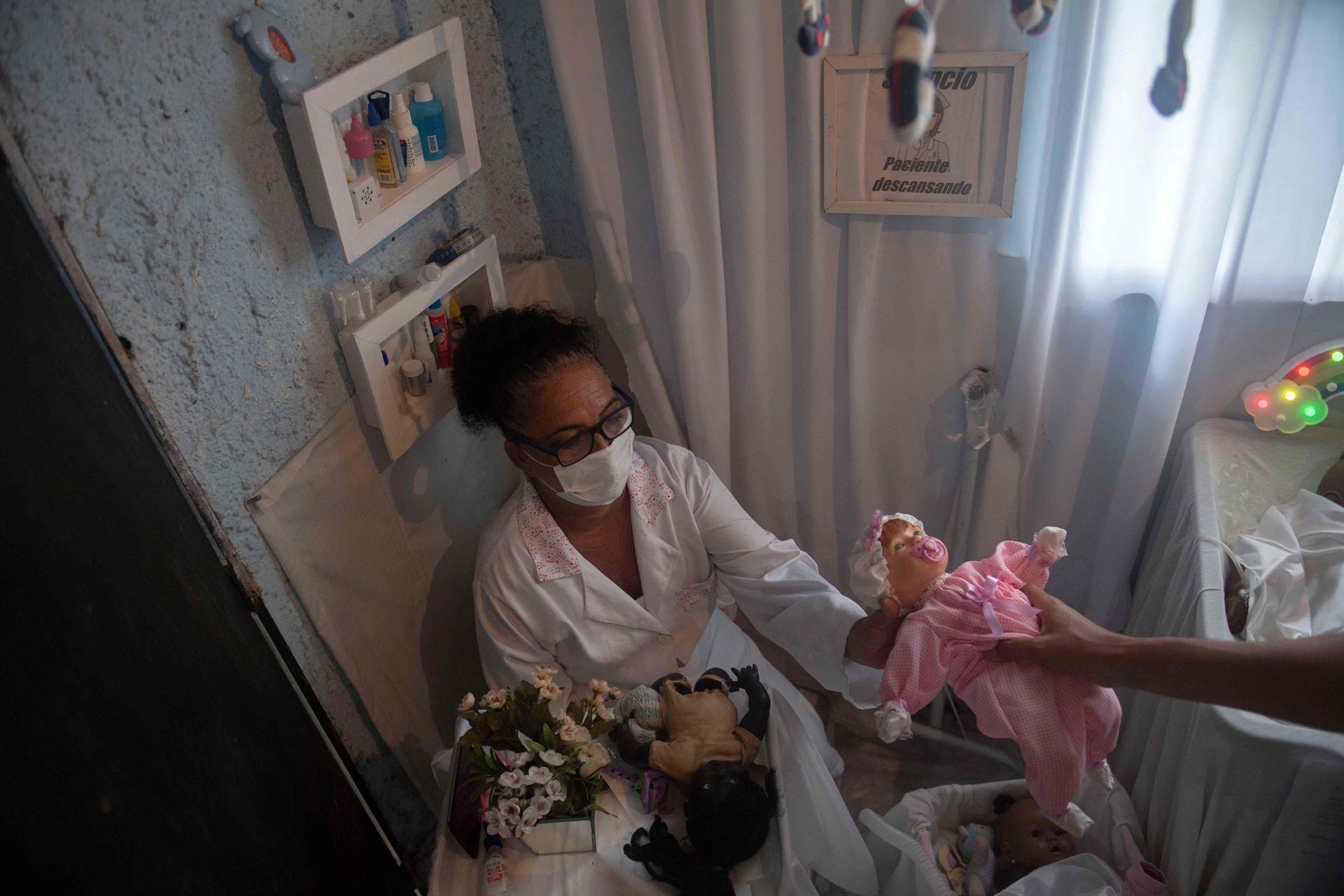 As Brazil reels from pandemic, doll hospital makes kids smile