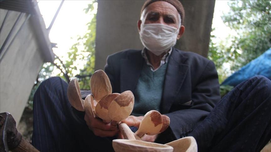 Local man carves wood pieces into beautiful spoons
