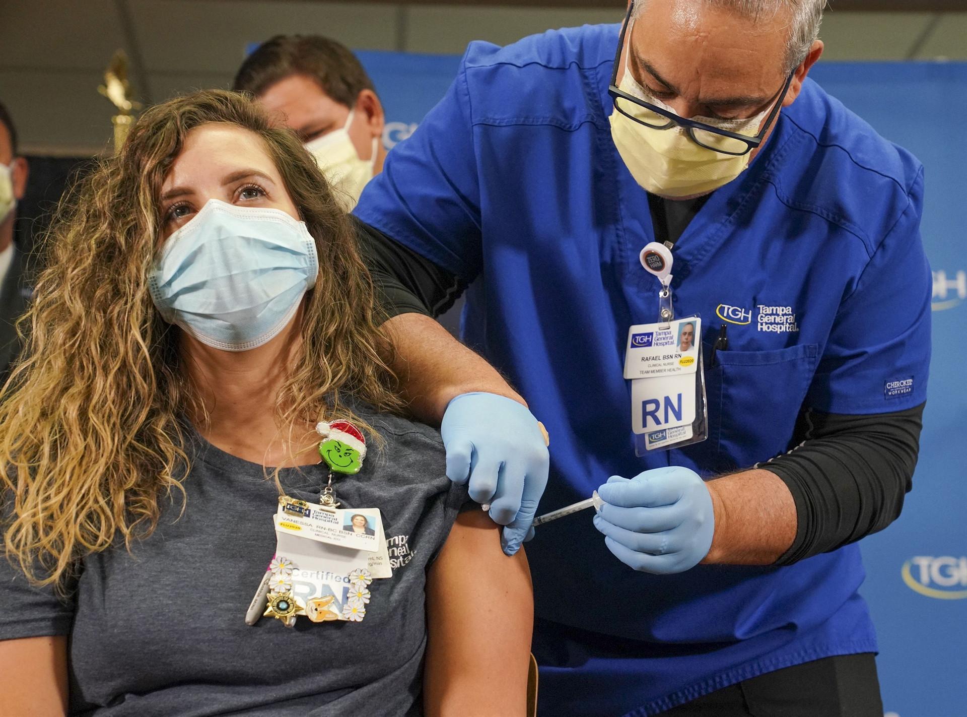 Europe eases UK travel bans as US passes one million vaccinations