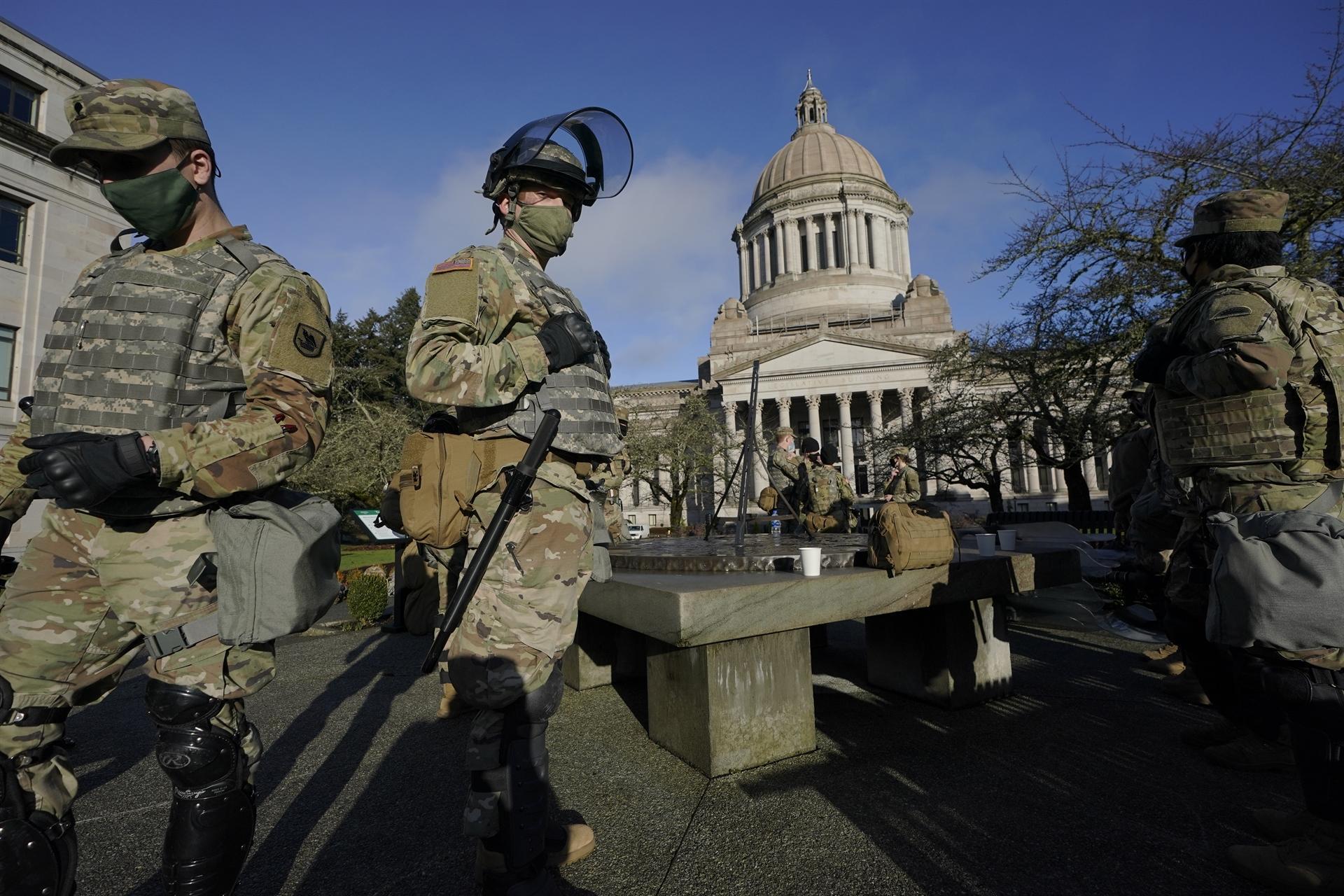 Guard troops pour into Washington as states answer the call