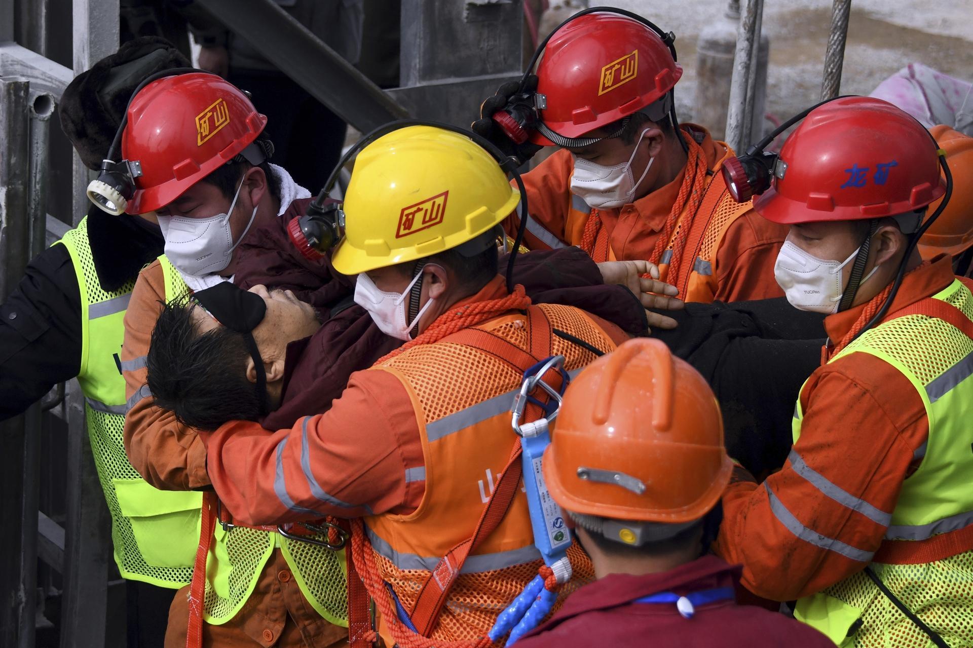Trapped for 2 weeks, 11 workers rescued from China gold mine