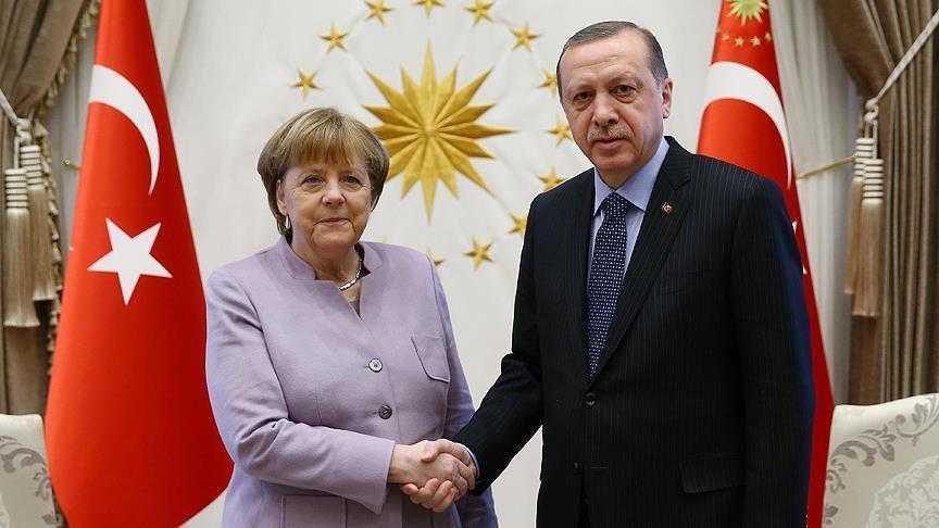 Talks for new migrant deal should start immediately, Erdoğan tells Merkel