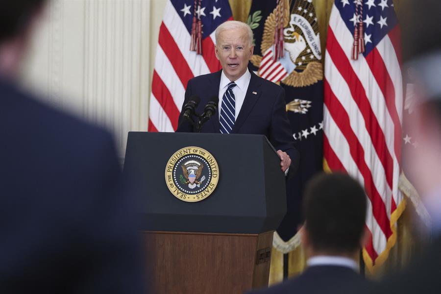 Biden vows action on migrants as he defends border policy