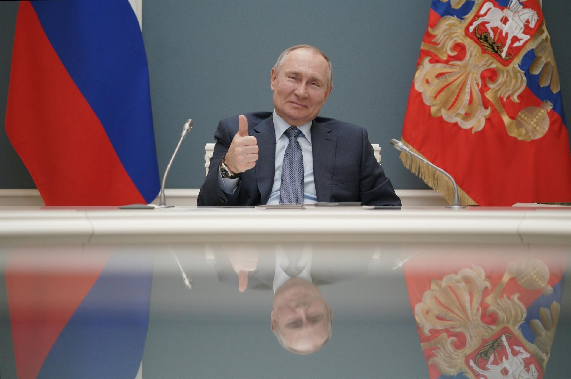 Putin signs law allowing him 2 more terms as Russia’s leader