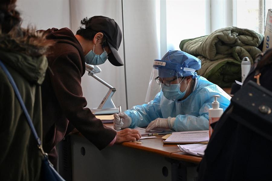 China weighs carrots and sticks in push to vaccinate millions