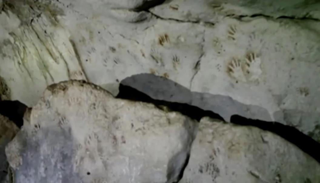 In Mexico, ancient Maya cave reveals mysterious painted hand prints
