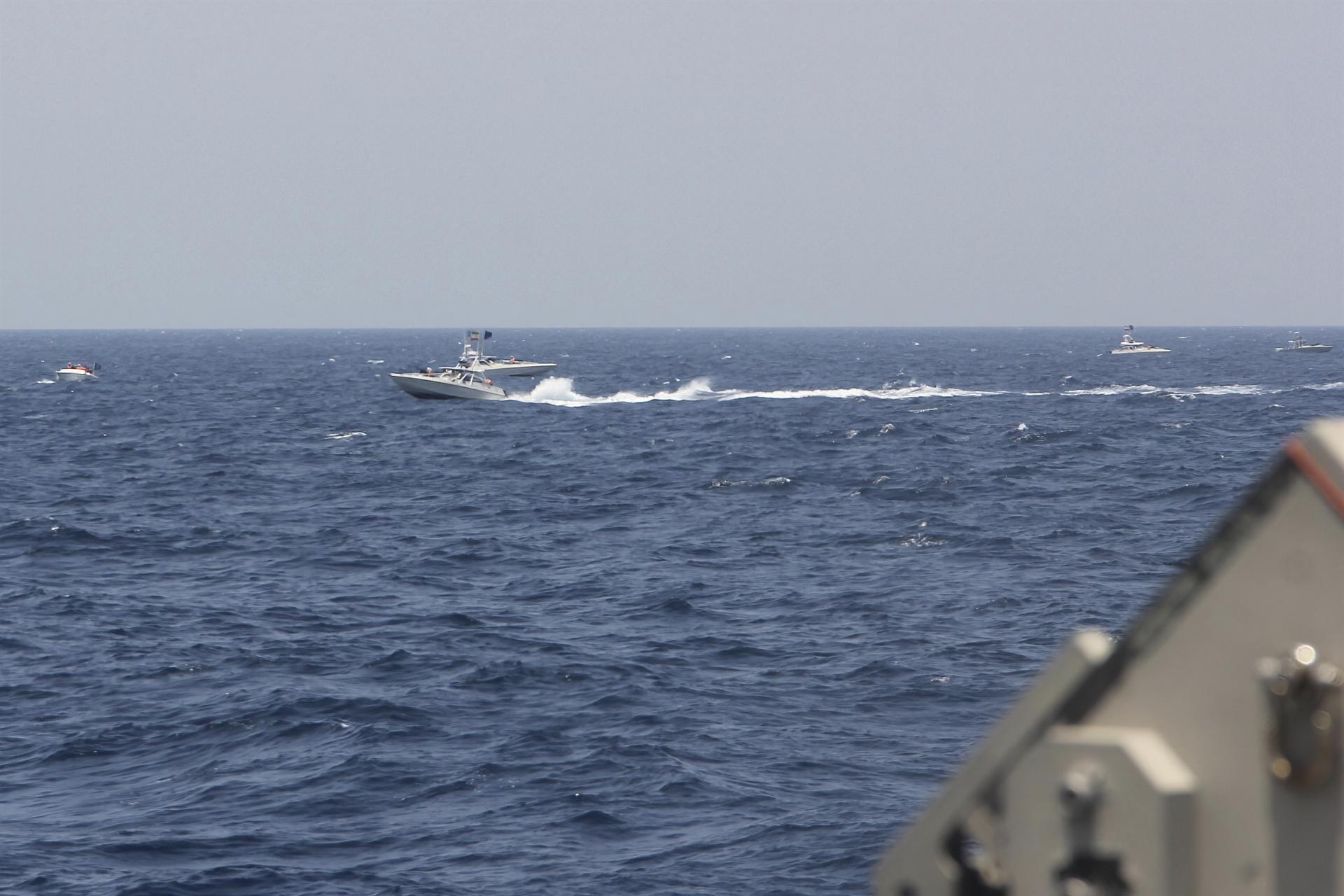 US ship fires warning shots in encounter with Iranian boats