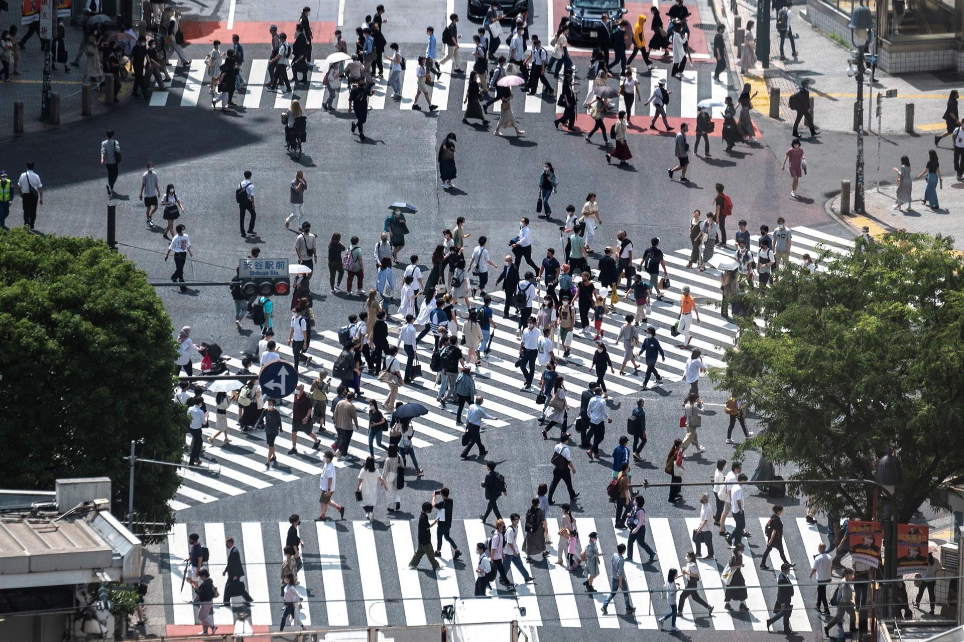 Japan to lift virus emergency one month before Olympics