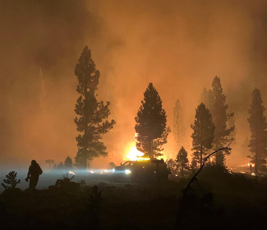 Major US wildfire grows, forcing new evacuations