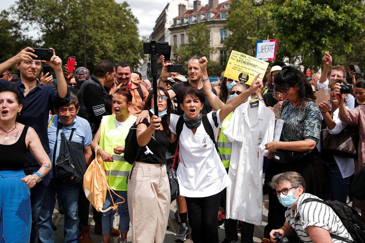 Big protests mark global anger at COVID restrictions
