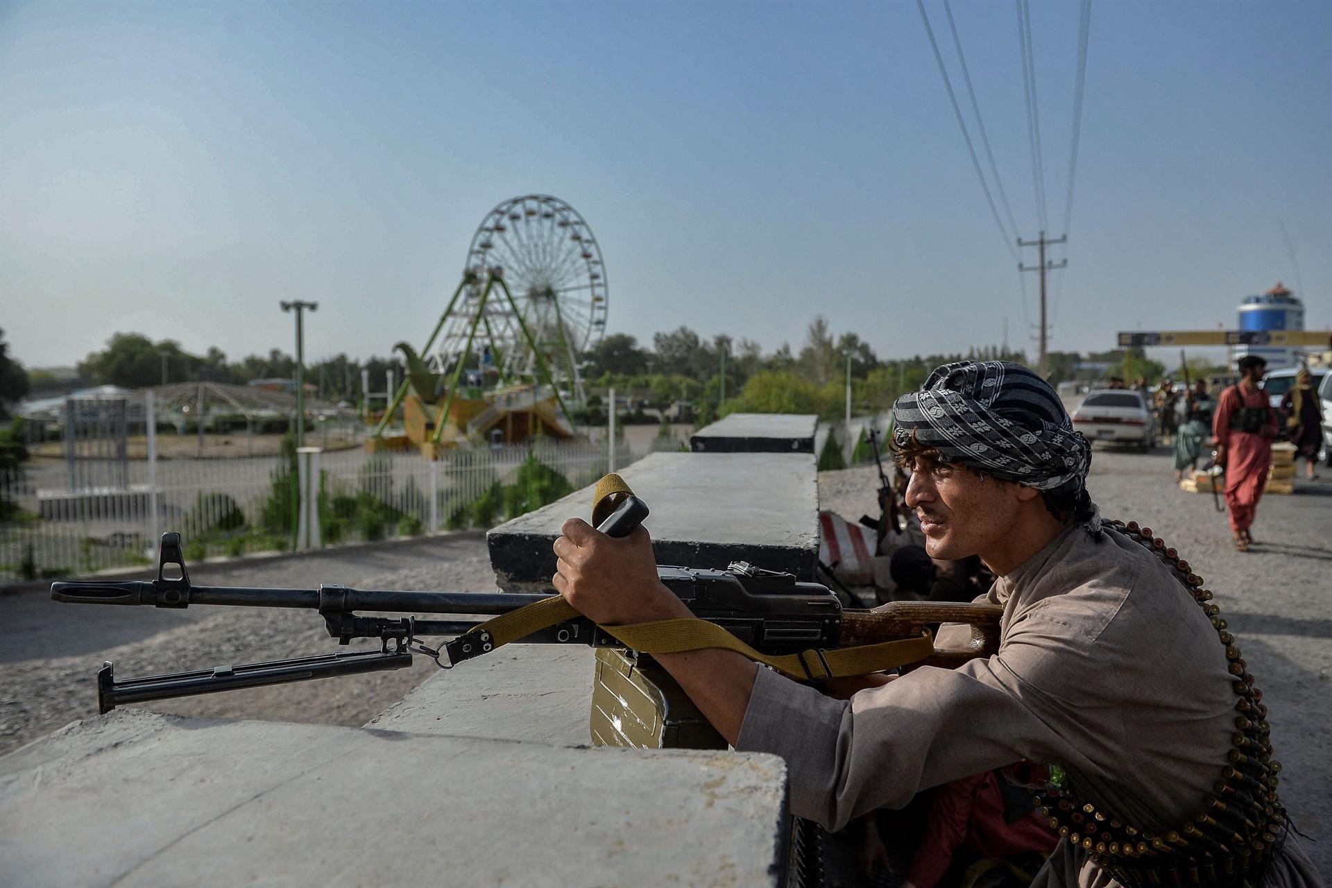 Afghan forces battle to thwart Taliban assaults on key cities