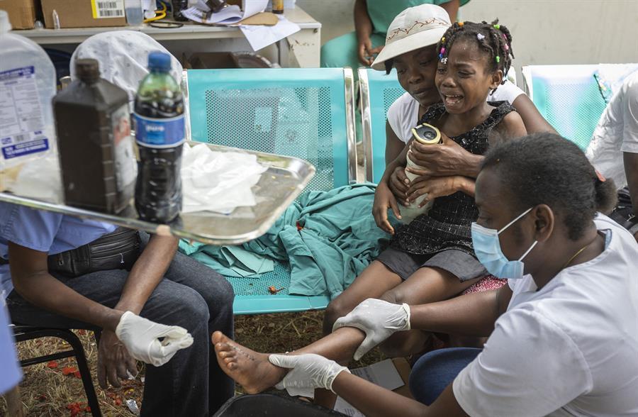 Desperate search after Haiti quake as storm threatens