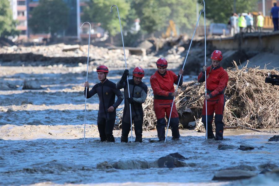 Efforts continue to search for missing people in flood-hit towns