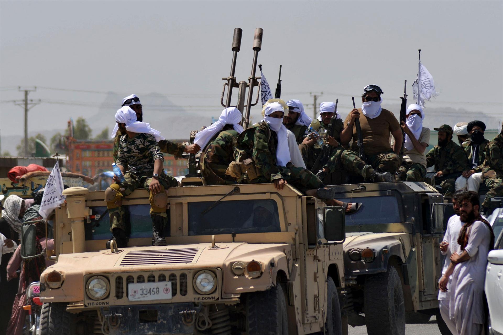 Taliban show off US plunder as first flight lands in Kabul since pullout