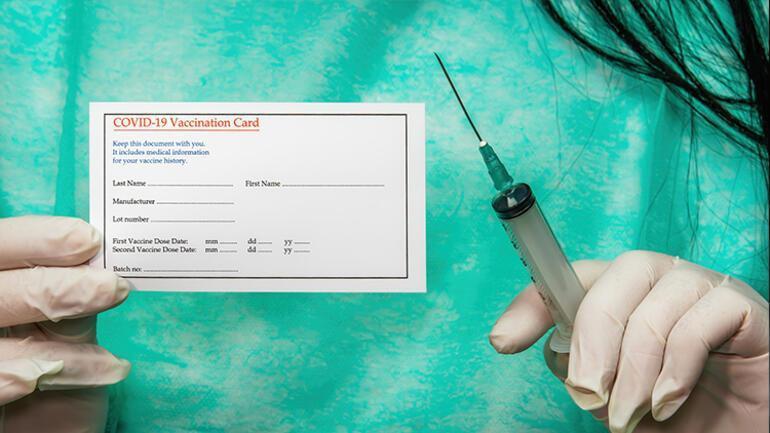 Nurses arrested over vaccine card scam