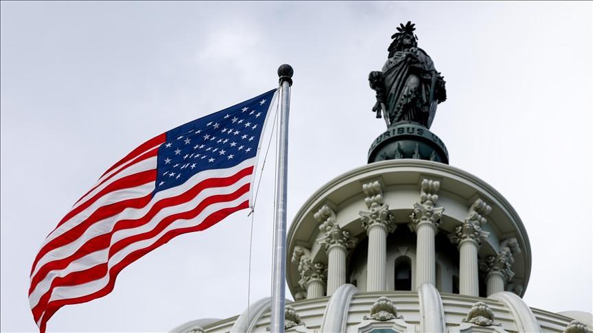 US Congress votes to avert government shutdown at midnight